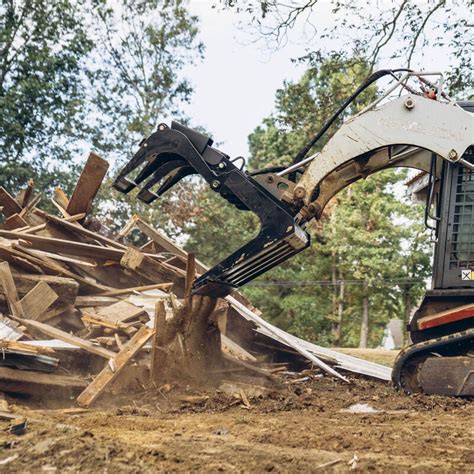 titan skid steer grapples